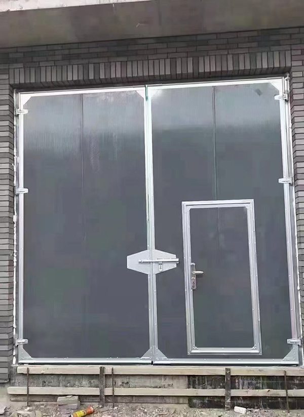 宜君工业平开门在大型设备制造车间的应用实例